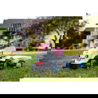 Traktorius Rainbow White su priekaba nuo 1 metų