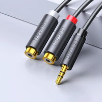 garso adapterio lizdas iš 3,5 mm vyriškos į 2xRCA moterišką 0,25 m pilkos spalvos (AV109)