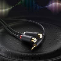 garso adapterio lizdas iš 3,5 mm vyriškos į 2xRCA moterišką 0,25 m pilkos spalvos (AV109)