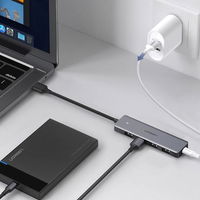 USB šakotuvas - 4x USB 3.2 Gen 1 su micro USB maitinimo prievadu, pilkos spalvos (CM219 50985)