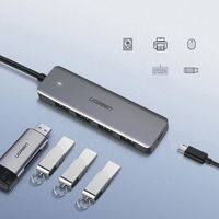 USB šakotuvas - 4x USB 3.2 Gen 1 su micro USB maitinimo prievadu, pilkos spalvos (CM219 50985)