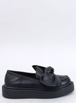 Moccasins with a STARK BLACK bow