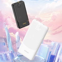 Baltas 10000 mAh išorinis įkroviklis su dviem USB-A lizdais