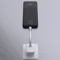 Baltas 10000 mAh išorinis įkroviklis su dviem USB-A lizdais