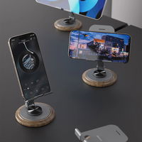Metalinė pilka telefono laikiklio stotelė su 360° pasukimu