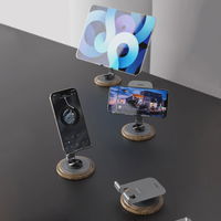 Metalinė pilka telefono laikiklio stotelė su 360° pasukimu