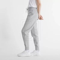 Moteriškos pilkos sportinės kelnės su pašiltinimu New Balance