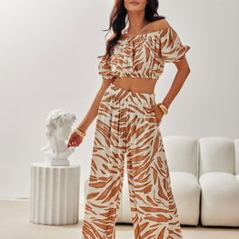 Moteriškos raštuotos vasarinės plačios kelnės Roco Fashion