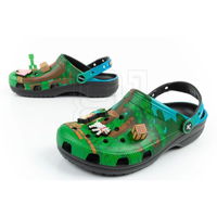 Guminės šlepetės vaikams žaliai juodos su Minecraft motyvais Crocs (SW1588132)